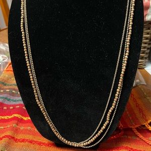 Never worn! Beautiful long beaded necklace